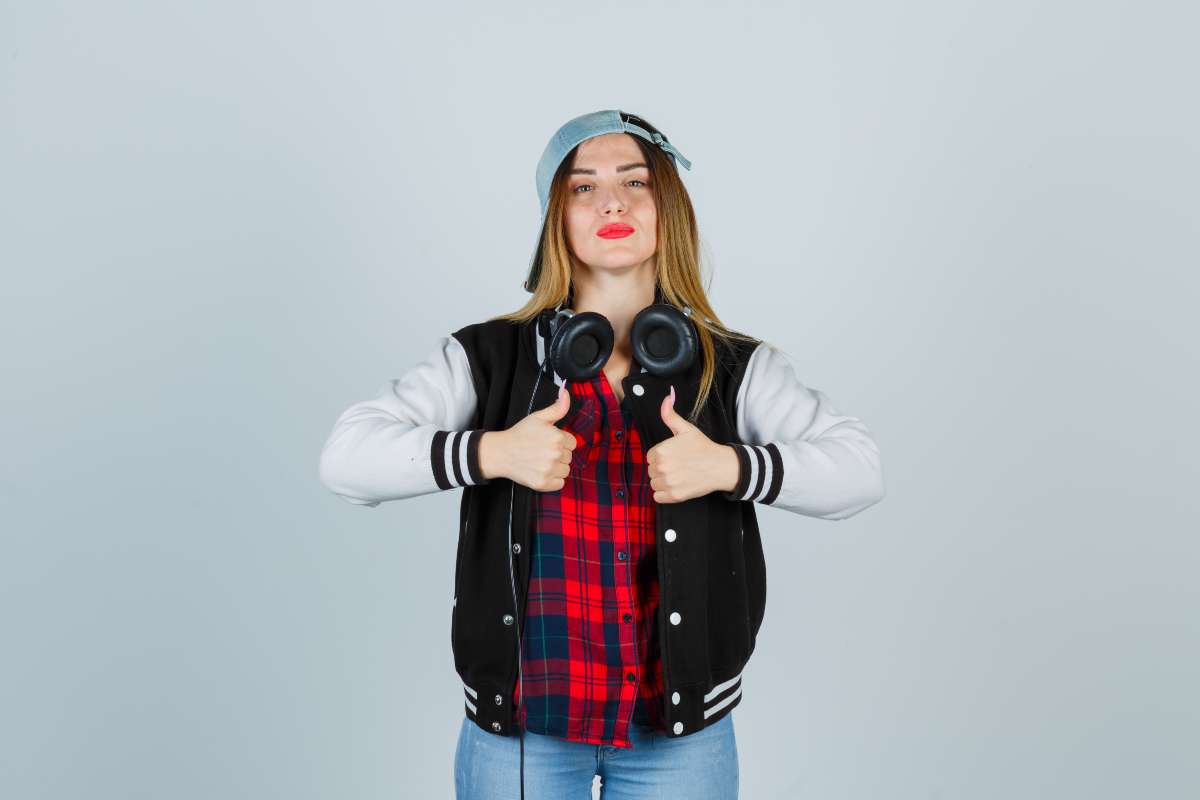 Stylish varsity jackets featuring classic patches and ribbed cuffs.