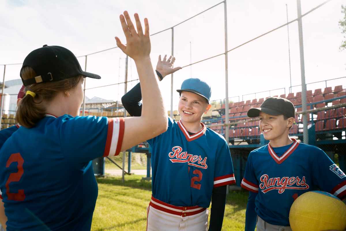Red and white baseball uniform with team logo, Custom Baseball Uniforms